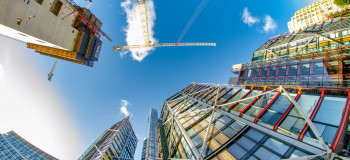 Upwards shot of skyscrapers and cranes   London