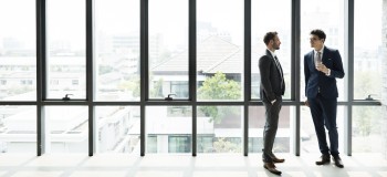Two agents in an office