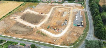Aerial view of a large housing development construction site
