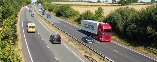 A14 dual carriageway with trees and traffic