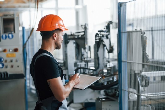 Industrial worker indoors in factory