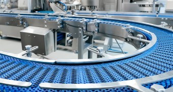Empty modern conveyor belt of production line, part of industrial equipment in factory plant  Automatic system line