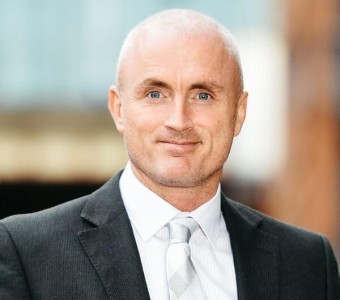 Mike Coogan Associate Director